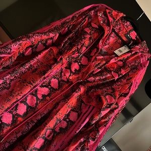 Ivy Park Ivy Hearts Allover print long convertible jacket.